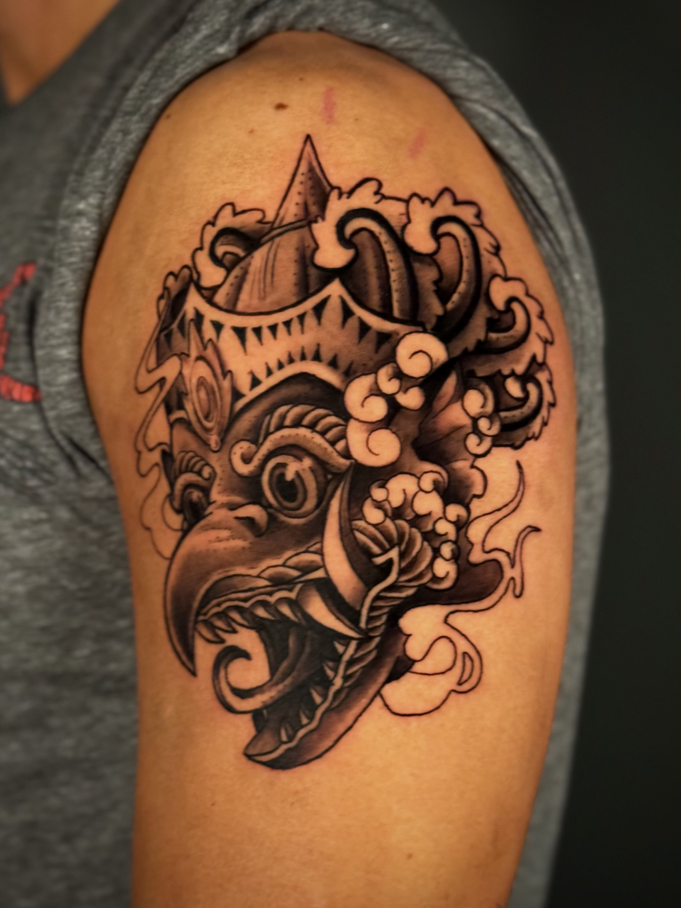 Black & Grey Garuda Mask Tattoo