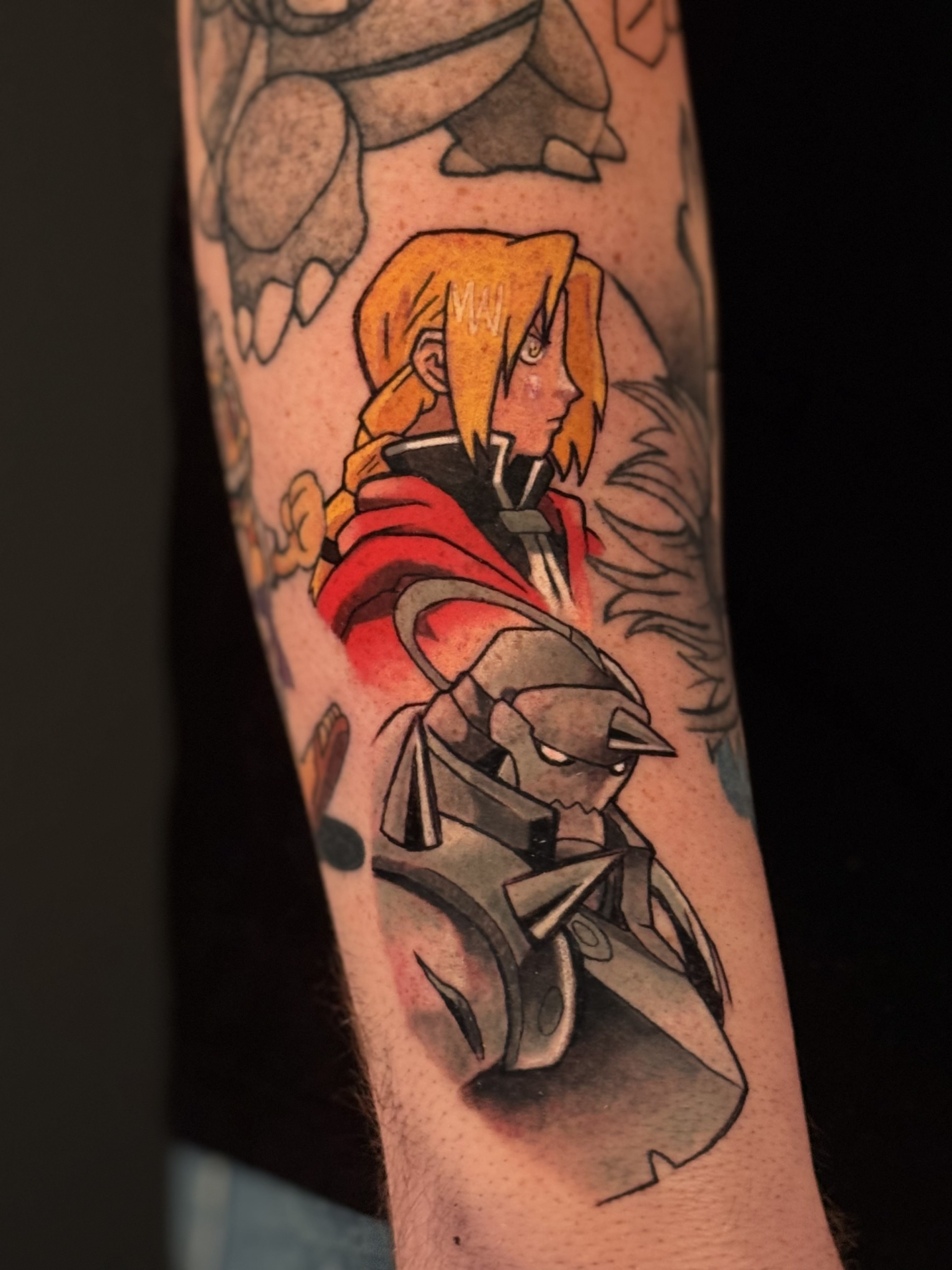 Black And Grey Anime Tattoo